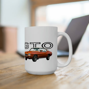 1971 GTO 15oz ceramic mug on wooden table, featuring a classic car graphic.