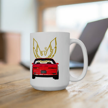1988 GTA Trans AM 15oz ceramic mug with car graphic and logo on a wooden table.