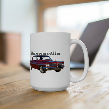 1962 Bonneville 15oz ceramic mug on wooden table, featuring vintage car design.