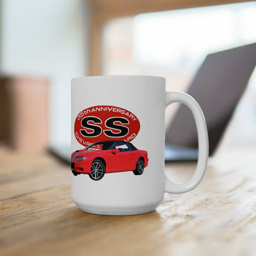 2002 35th Anniversary Camaro SS 15oz ceramic mug on table, featuring red logo design.