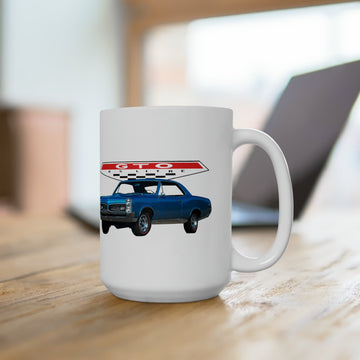 1967 GTO 15oz ceramic mug with classic car graphic, shown on a wooden surface.