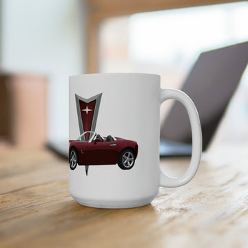 2009 Solstice 15oz ceramic mug with red car graphic, dishwasher and microwave safe.